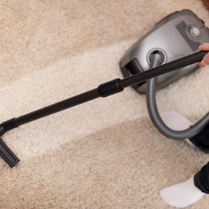 close-up-vacuuming-carpet
